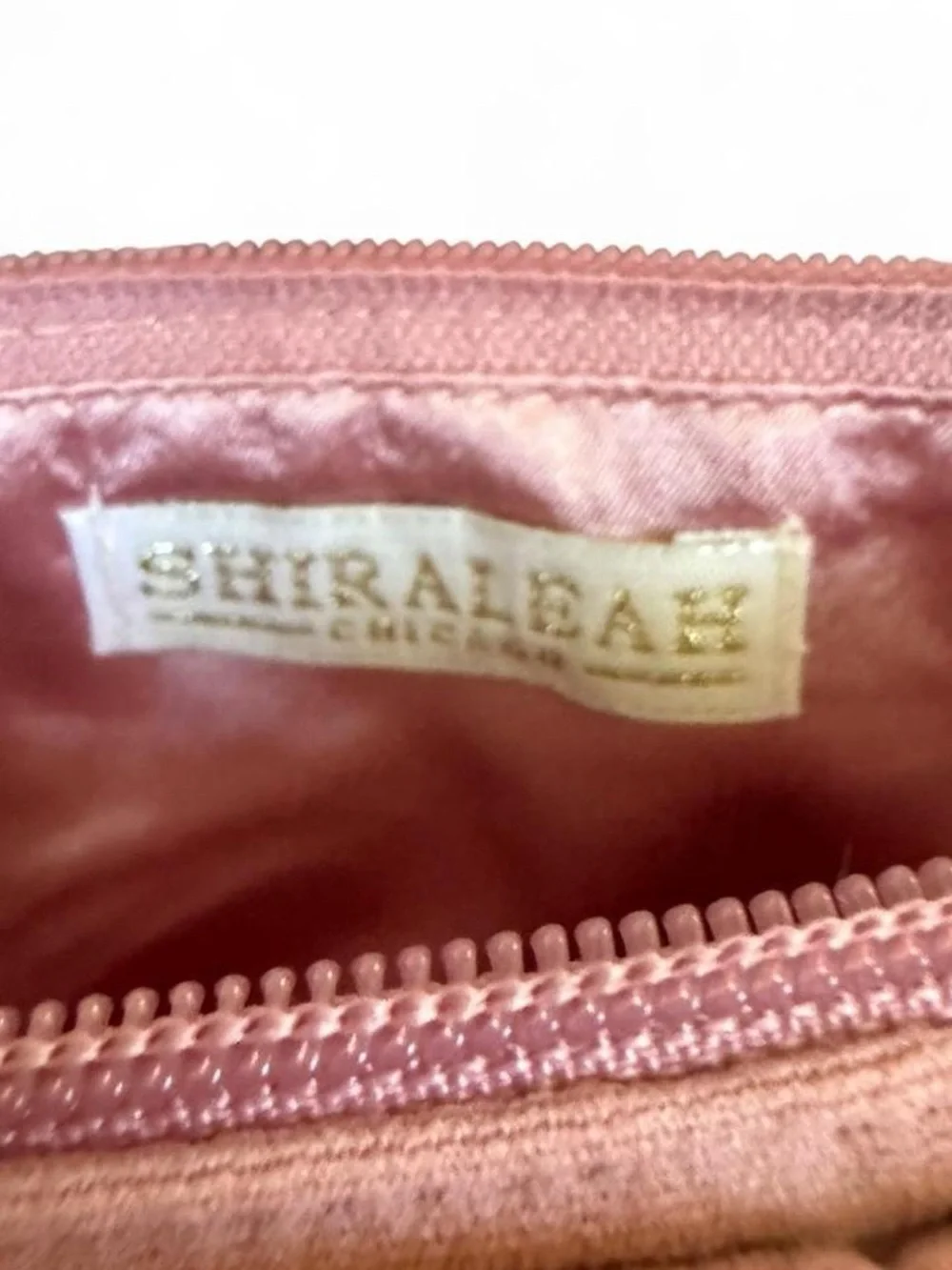 Shiraleah Chicago Pink Bow Clutch with light pink floral pattern